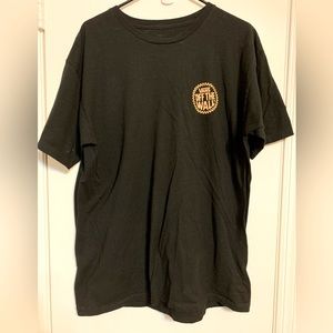 Vintage Vans t , size Mens Large , black t with Vans Logo on the back